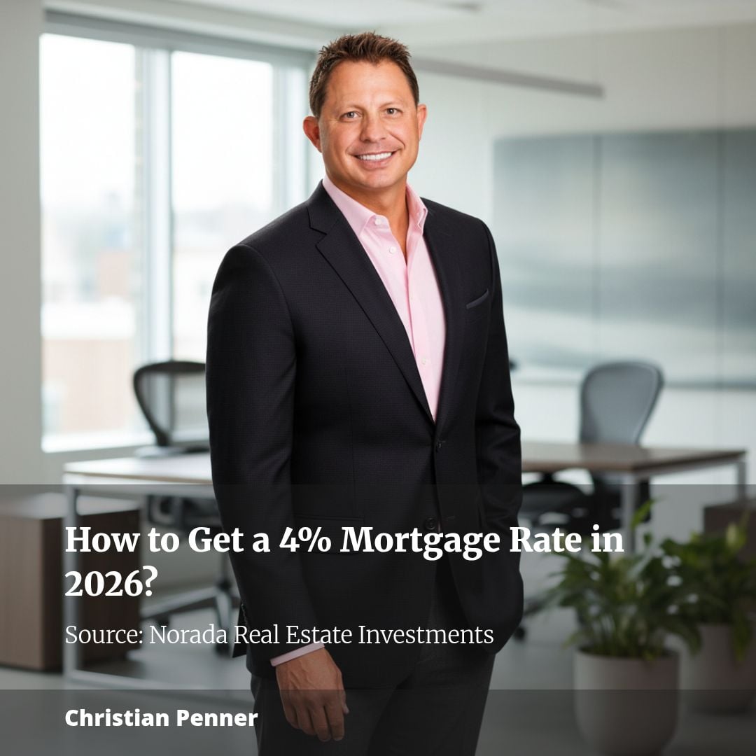 Smiling man in office discussing 4% mortgage rates.