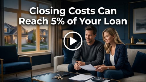 Couple reviewing closing costs at home.